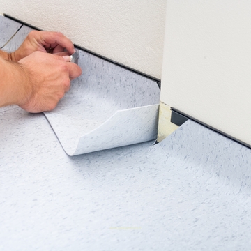 Pose sol avec remontées en plinthes